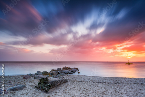 Baltic sea beach during sunrise in Gdynia. Baltic Sea. Poland © vivoo