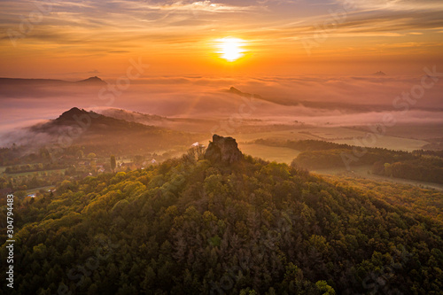 Oltarik is a castle ruin on the hill of the same name in the Ceske stredohori Mountains. It rises above the village of Dekovka ten kilometers southwest of Lovosice in the district of Litomerice
