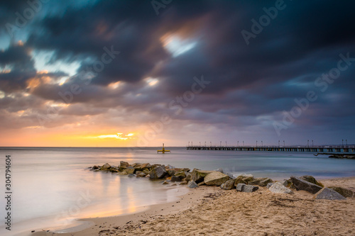 Baltic sea beach during sunrise in Gdynia. Baltic Sea. Poland