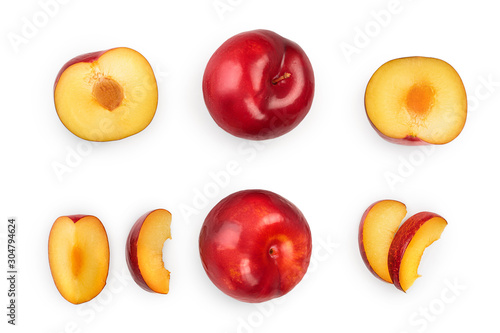 fresh red plum and half isolated on white background. Top view. Flat lay. Set or collection