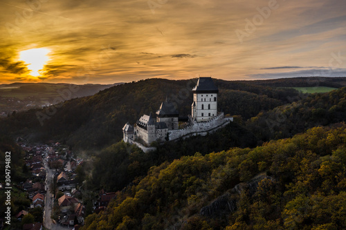 Karlstejn Castle is a large Gothic castle founded 1348 CE by Charles IV, Holy Roman Emperor-elect and King of Bohemia. There are hidden Czech crown jewels, holy relics, and other royal treasures. 