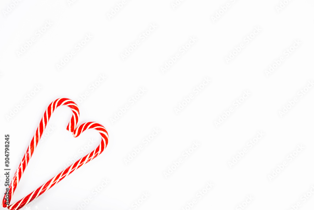 Heart shaped christmas candy on a white background. Heart shaped christmas candy on a white background.