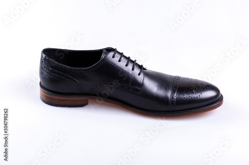 black leather shoes isolated on white background