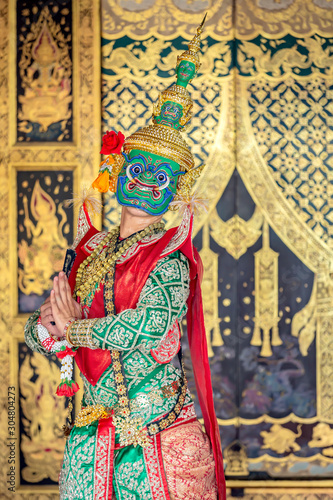 Thai pantomime dance scene Ravana is wielding body weapons.