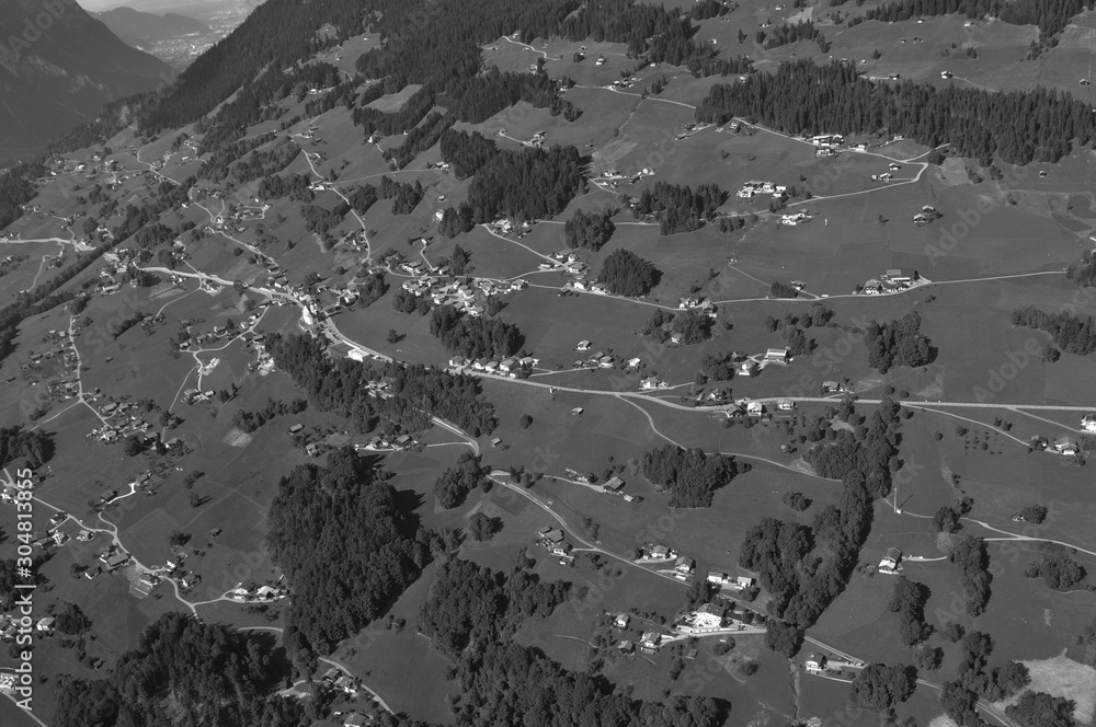 Austria: Paragliding-Airshot from Schruns village in Montafon-valley; Vorarlberg;