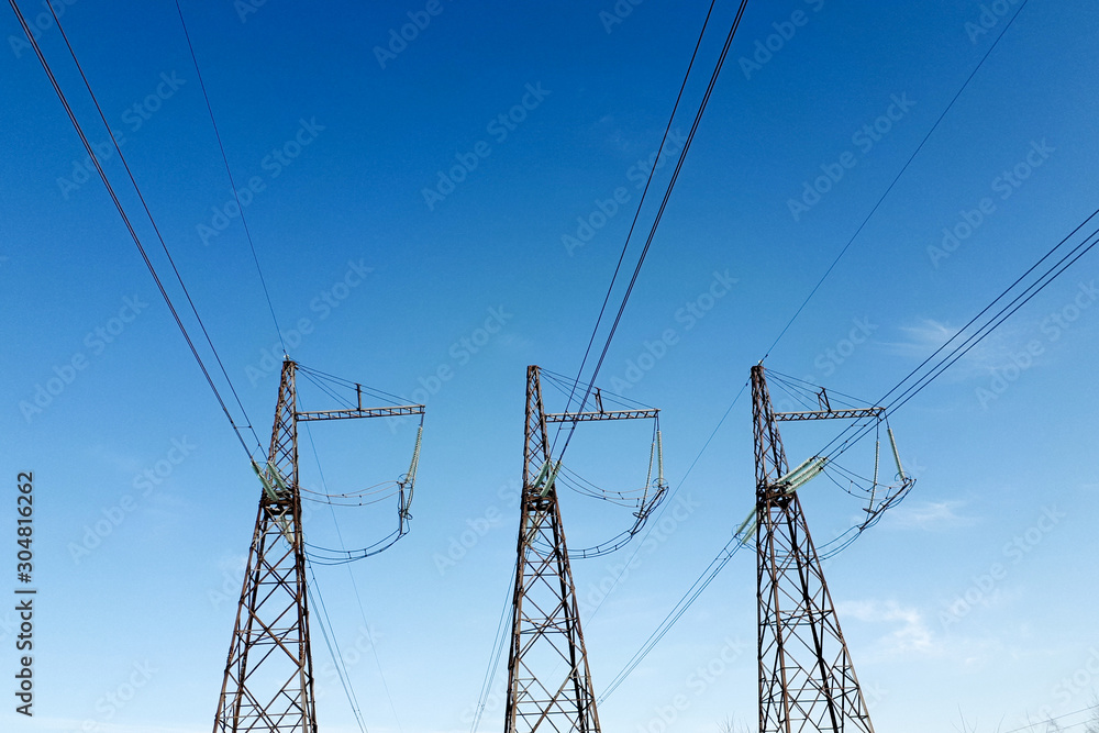 power lines against blue sky