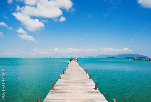 tropical wooden pier in turquoise sea, Thailand, Samui