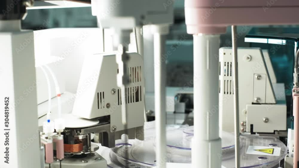 Modern Robotic Machine For Laboratory Tests. Modern Robotic Machine For Laboratory Tests.