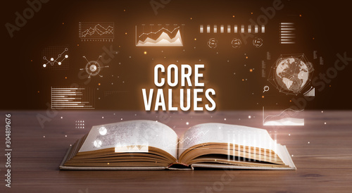 CORE VALUES inscription coming out from an open book, creative business concept