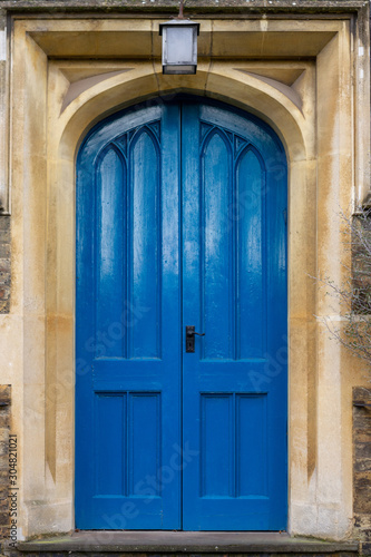 Blue wooden church door © nowyn