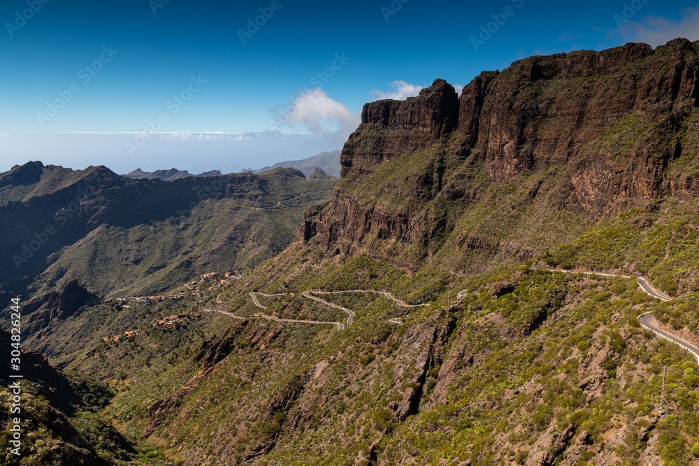 Panoramic view of the Macizo de Teno mountains with curvy roads leading to Masca village in Tenerife, Canary Islands