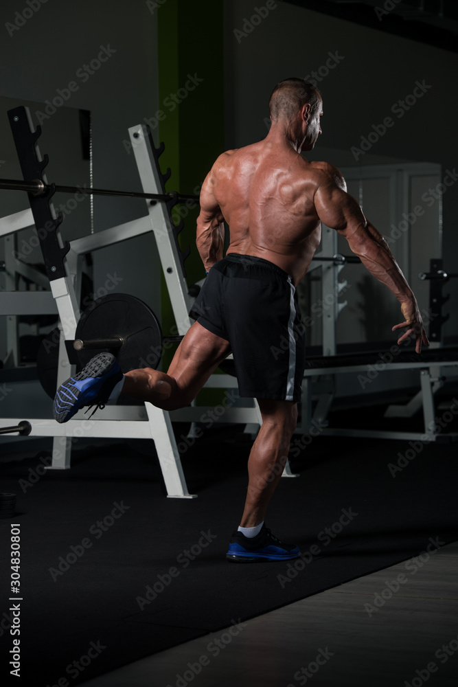 Mature Man Flexing Muscles