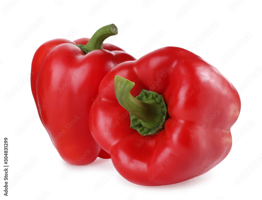 Ripe red bell peppers isolated on white Ripe red bell peppers isolated on white