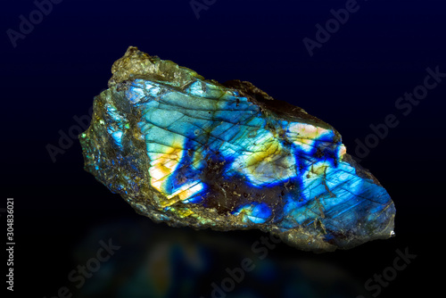 Macro shooting of gem raw natural Labradorite mineral texture as very nice natural background , photo