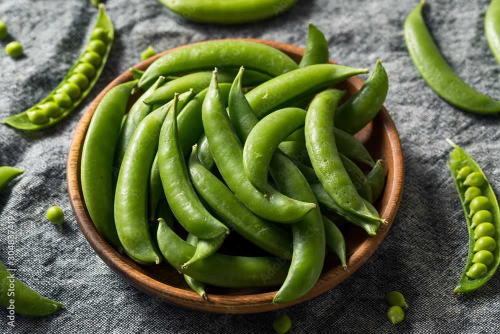 Raw Green Organic Sugar Snap Peas Raw Green Organic Sugar Snap Peas