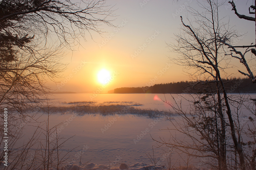 Sunset over a snowy lake Sunset over a snowy lake