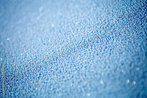Blue frost on glass. Hoarfrost background close up, copy space