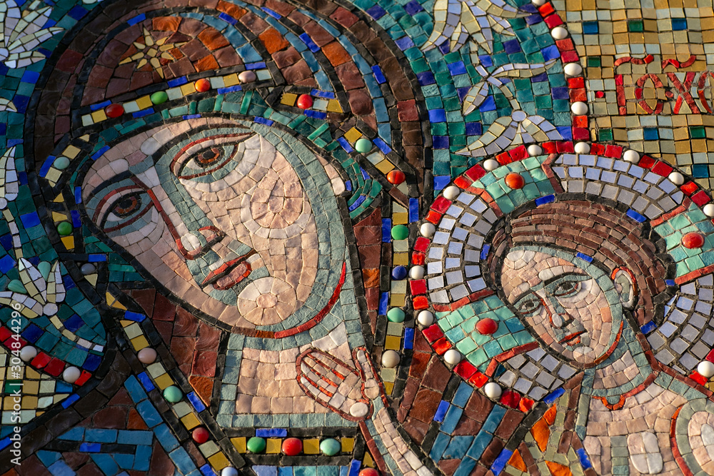 Orthodox mosaic icon of the Virgin (Holy Virgin Mary) on the wall of an Orthodox church in Moscow
