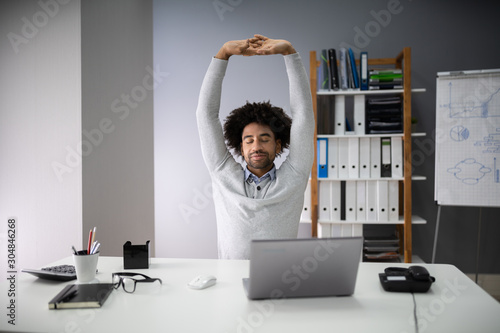 Businessman Stretching His Arms