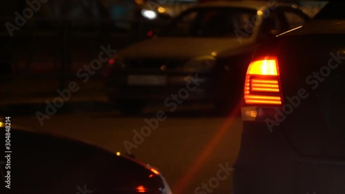 Emergency flashing car rear light lamp at night