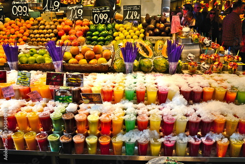 Ready to eat fruit salad in plastic container at La Boqueria Market in Las Rambas, Barcelona, Spain)