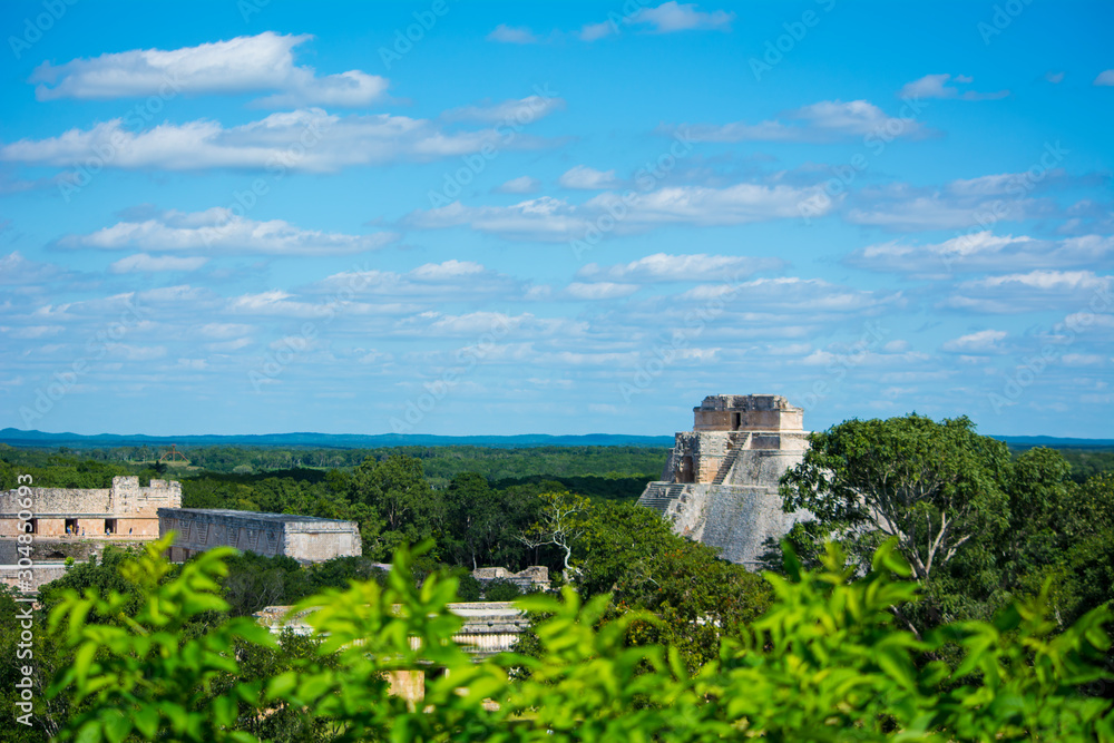 Pyramid of the fortune teller surrounded by the jungle located in the archaeological zone of Uxmal Pyramid of the fortune teller surrounded by the jungle located in the archaeological zone of Uxmal