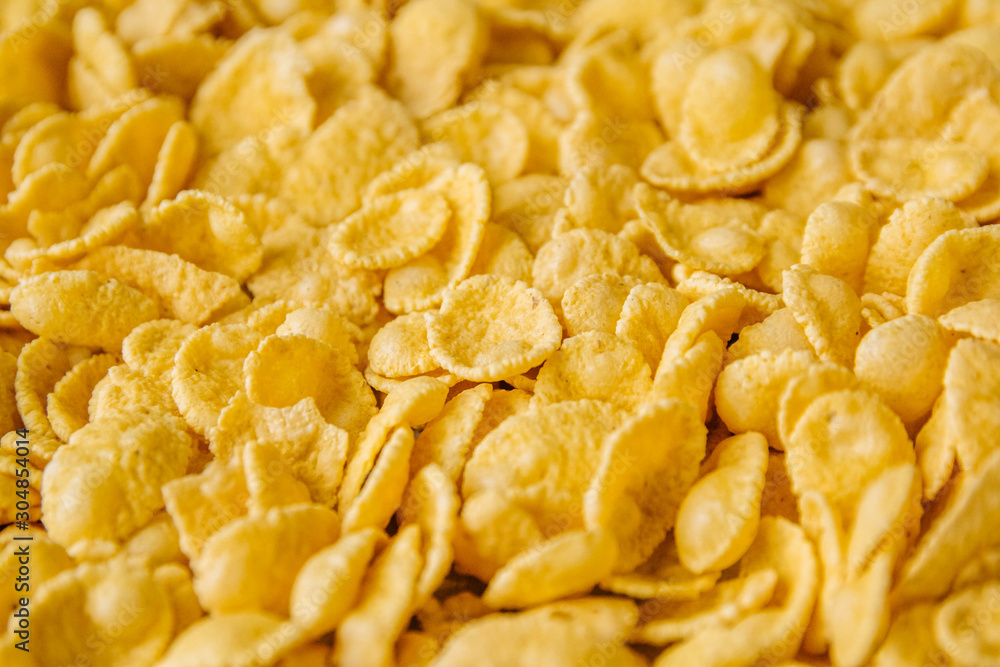 Corn flakes background and texture. Top view. Corn flakes background and texture. Top view.