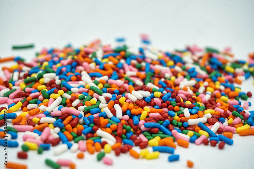 sugar sprinkles isolated, decoration for baked goods, cakes. Background sugar sprinkles isolated, decoration for baked goods, cakes. Background