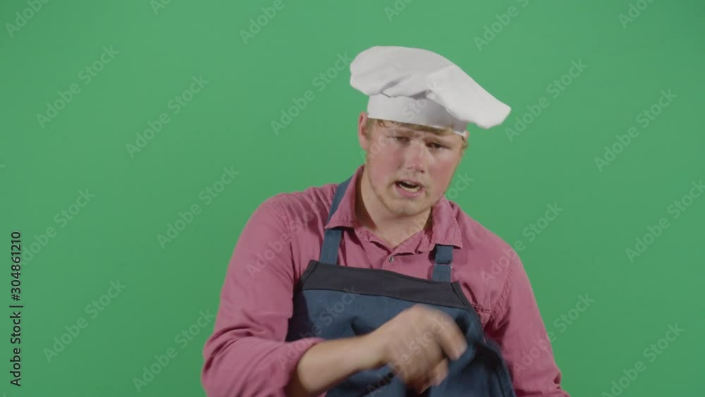 Adult Man Cook Cleaning His Mouth Adult Man Cook Cleaning His Mouth