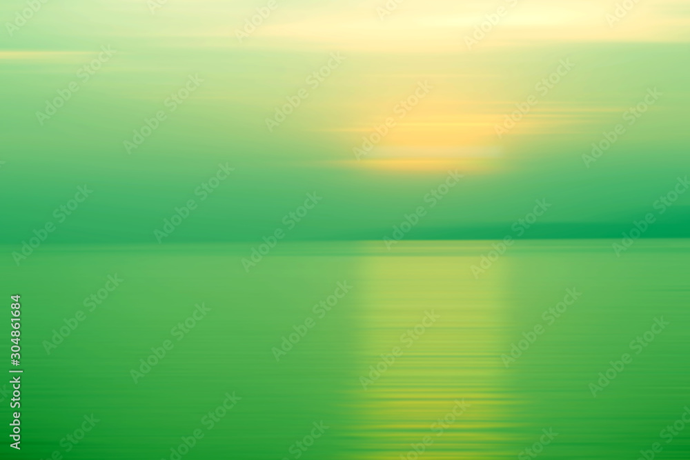 Fototapeta premium Abstract background motion blur sunset on the sea