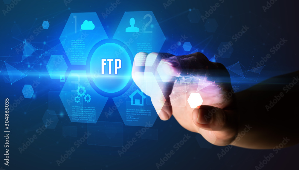 Hand touching FTP inscription, new technology concept Hand touching FTP inscription, new technology concept