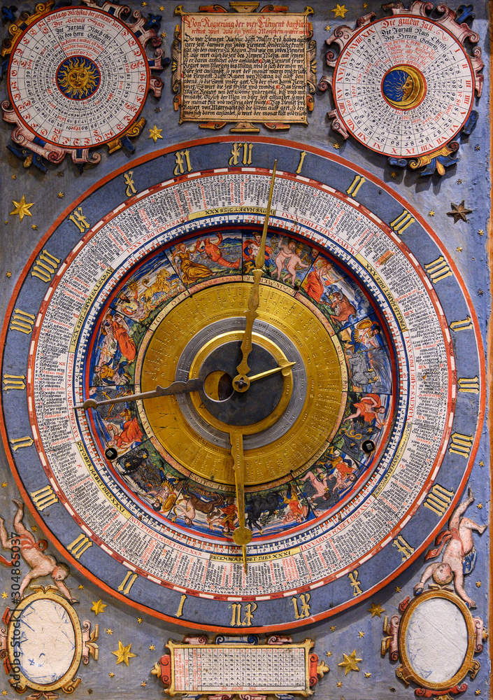 an ancient clock with constellations	