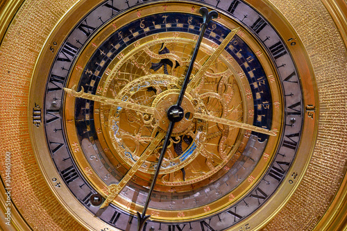 an ancient clock with constellations 
