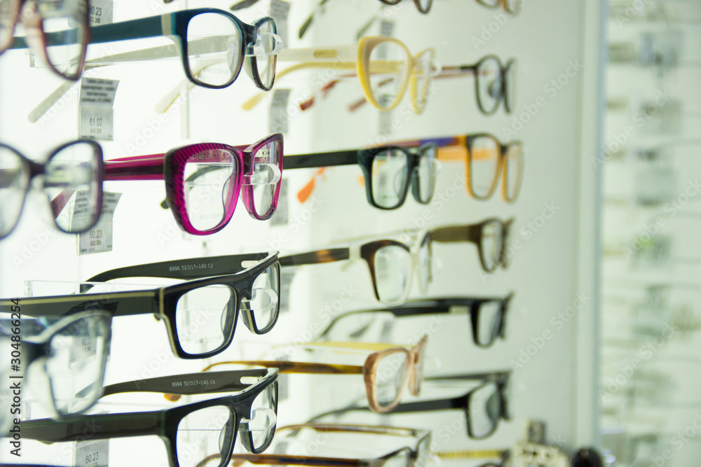 showcase with different spectacles, glasses