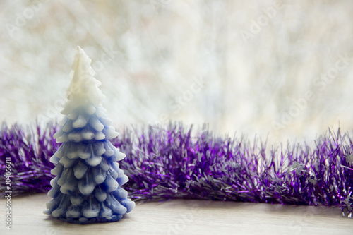 Christmas tree is on wood with blurred background