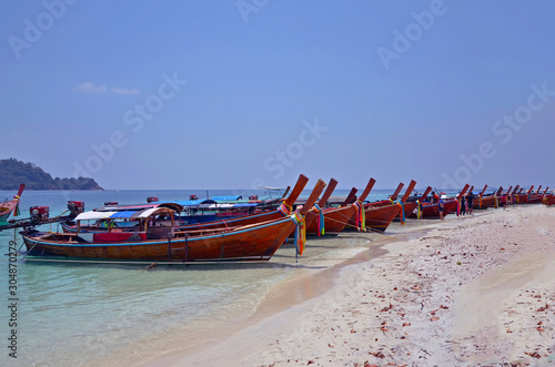 Longtail boat and beautiful ocean of Koh Lipe island,Satun Thailand © nopporn