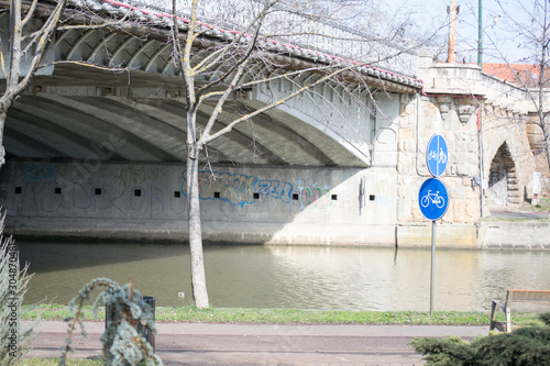 arch bridge on the bega river in timisoara romania photo