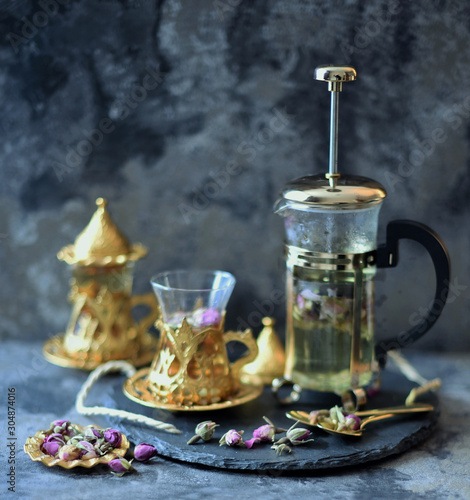 Herbal tea with rose buds, middle eastern food
