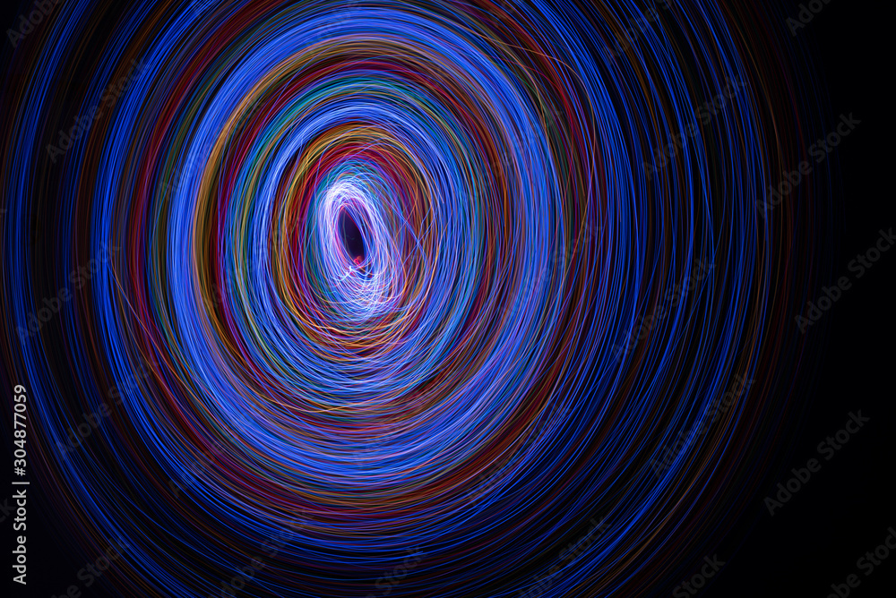 Blue / Red Circular abstract fractal background Painted with LEDs on long exposure Blue / Red Circular abstract fractal background Painted with LEDs on long exposure