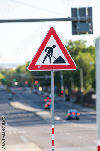 Dresden German Roadworks sign 123 cars background portrait