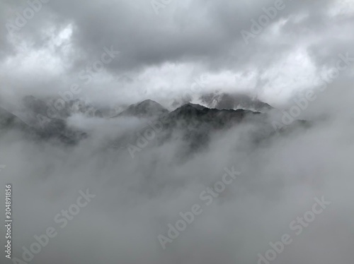Mountains behind clouds