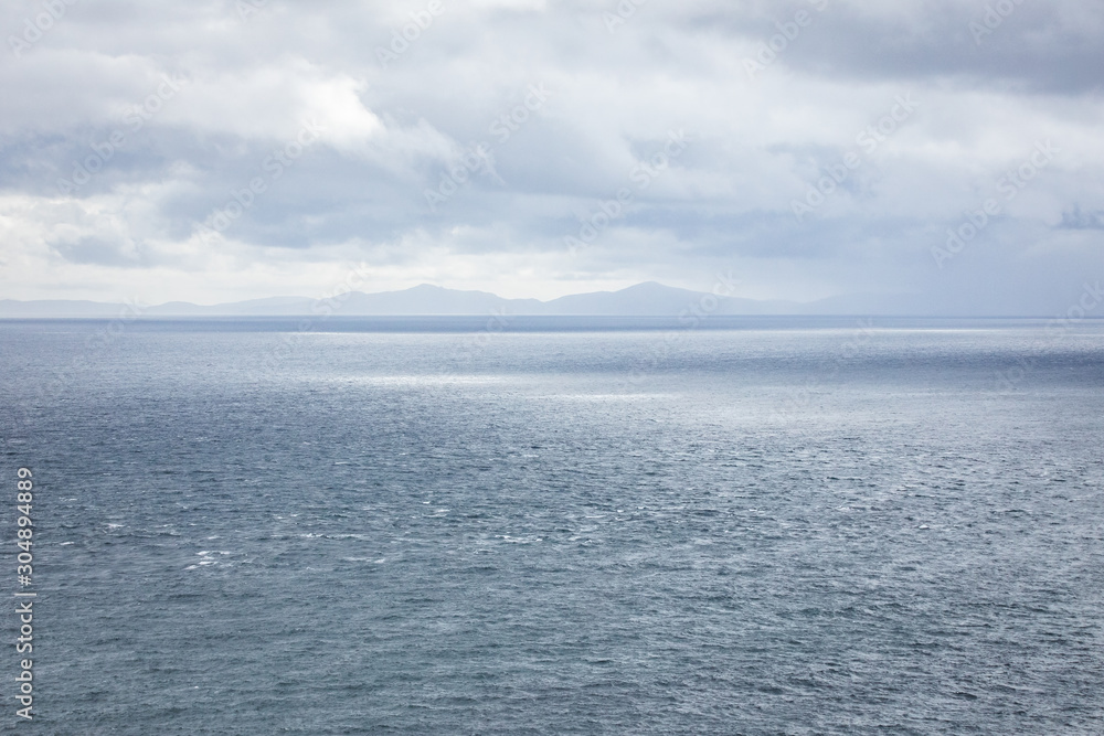 Waves breaking on coastal cliffs of Scotland.