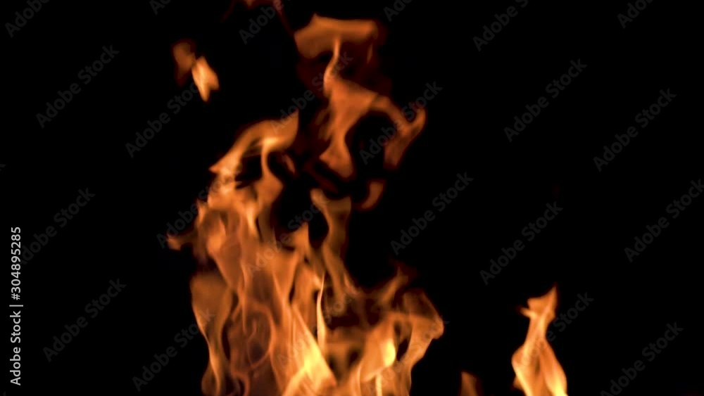 Slow motion shot of fire on a black background to use it transparent in every shot. Slow motion shot of fire on a black background to use it transparent in every shot.