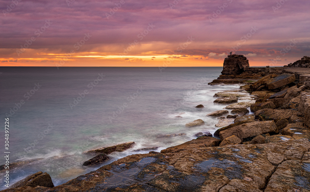 Fishermen on Pulpit Rock Portland at sunset