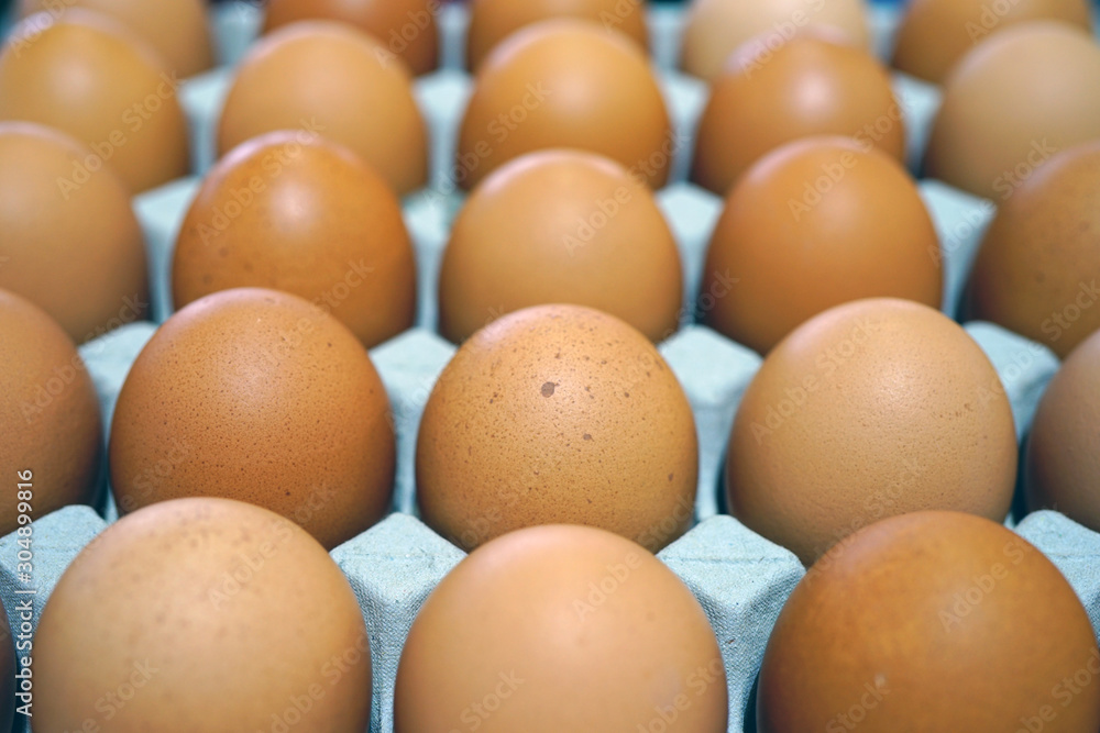 Cartons of fresh free-range brown organic eggs Cartons of fresh free-range brown organic eggs