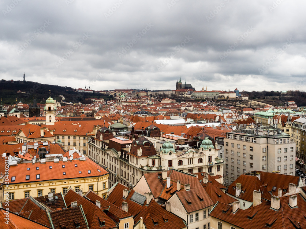 Panoramic view of Prague Old Town rooftops on a gloomy winter day - view from Old Town Hall Tower