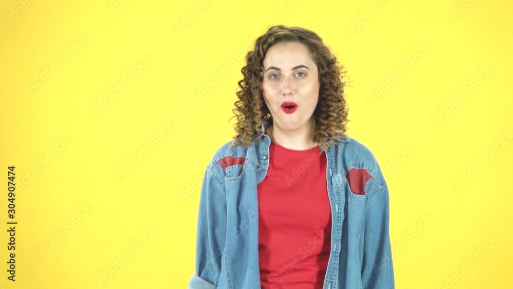 Woman enjoying the music and dancing with the red boombox on her shoulder, retro style, slow motion Woman enjoying the music and dancing with the red boombox on her shoulder, retro style, slow motion