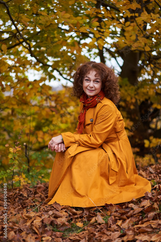 Autumnal portrait of a mature woman