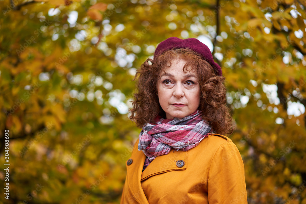 Autumnal portrait of a mature woman Autumnal portrait of a mature woman