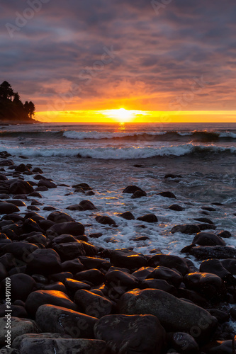 Seaside, Oregon Coast, United States of America. Beautiful View of a Rocky Beach on the Pacific Ocean during a dramatic summer sunset.